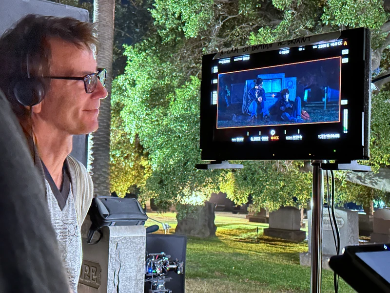 John Murlowski watching a monitor on location.